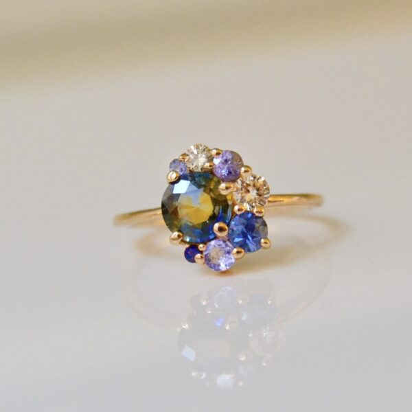 Ring with bi-color sapphire, champagne diamond, tanzanites and sapphires set in 18K yellow gold