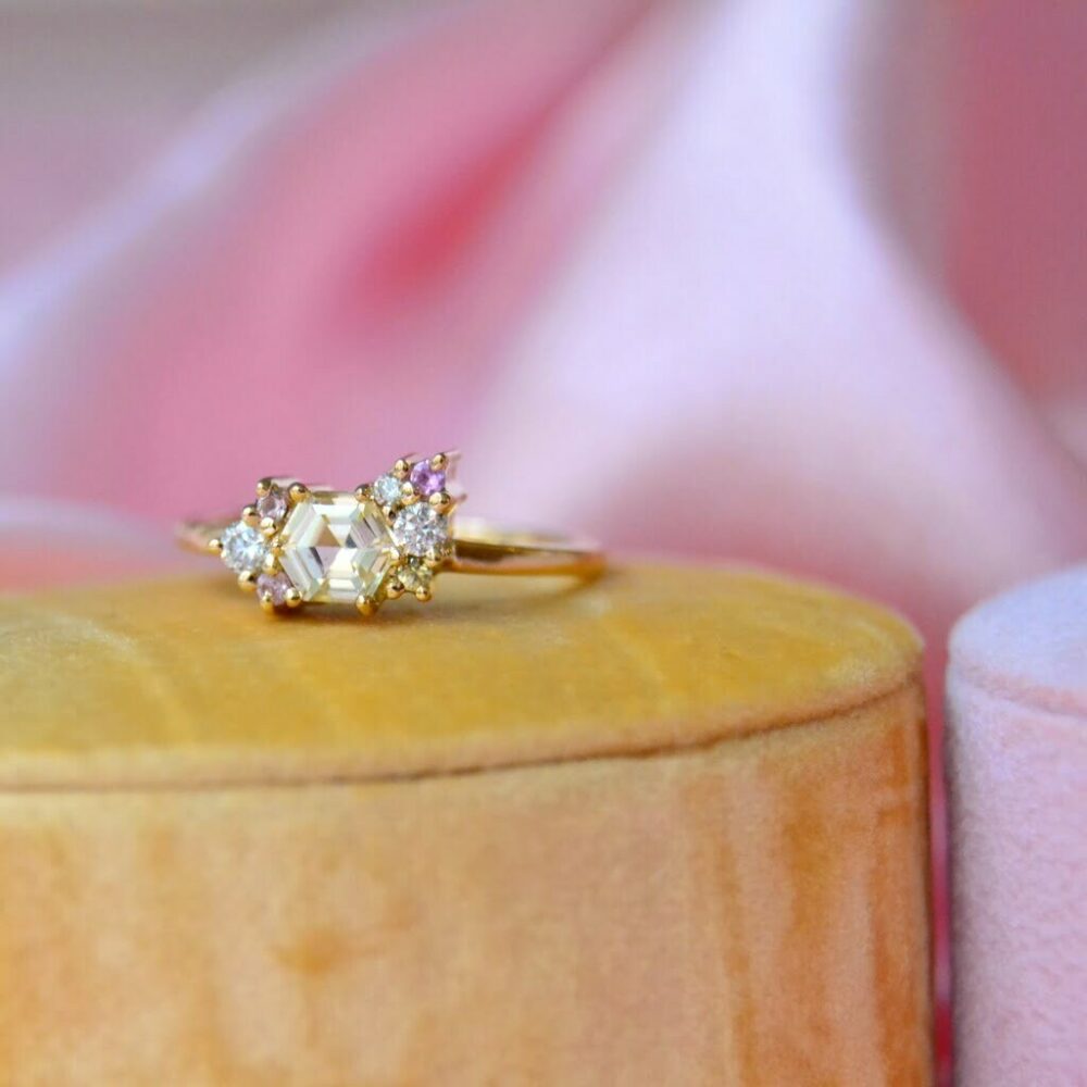 Yellow sapphire cluster ring with diamonds
