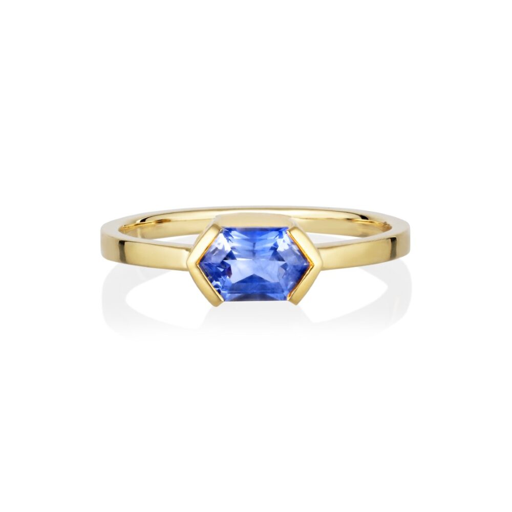 East west ring with blue sapphire set in 18K yellow gold