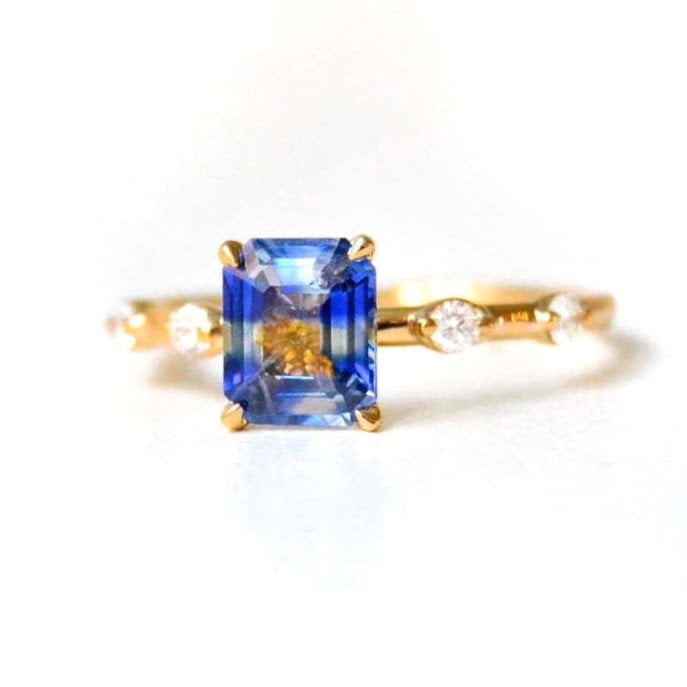 bi-color sapphire ring with diamonds set in 18k yellow gold