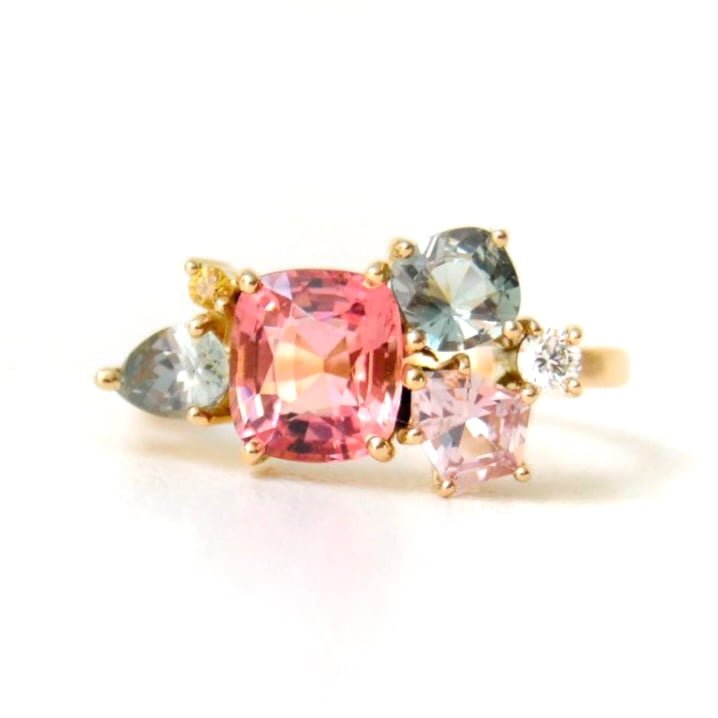 cluster ring with tourmaline and sapphires set in 18k yellow gold