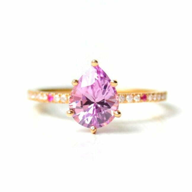 Pear shaped pink sapphire ring with diamonds