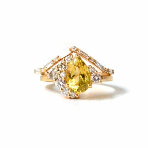Bi-color tourmaline ring stacked with a baguette diamond ring of 18k yellow gold