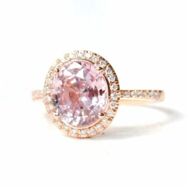 peach sapphire halo ring in rose gold with diamonds
