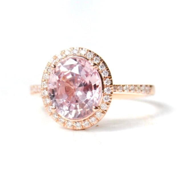 peach sapphire halo ring in rose gold with diamonds