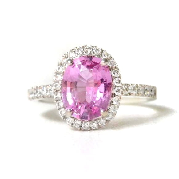 Halo ring with unheated pink sapphire and diamonds