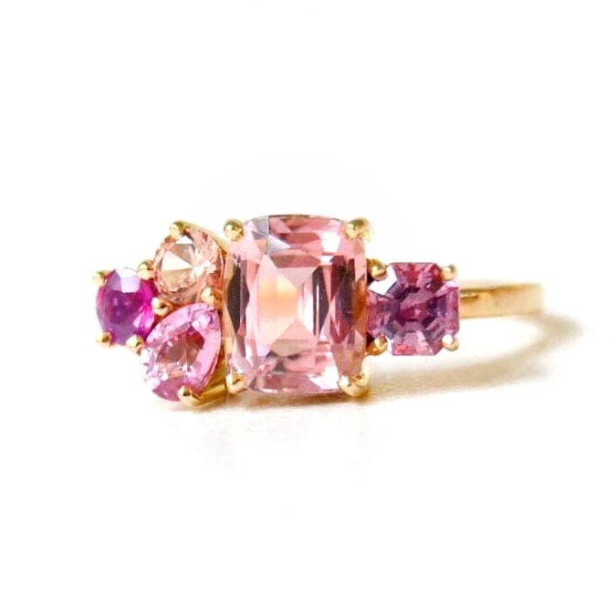 pink tourmaline ring with sapphires set in 18k yellow gold