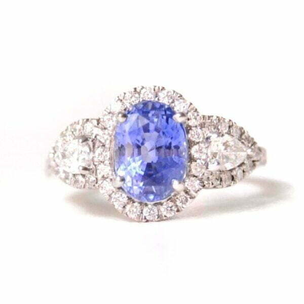 Light blue sapphire ring with diamonds set in platinum