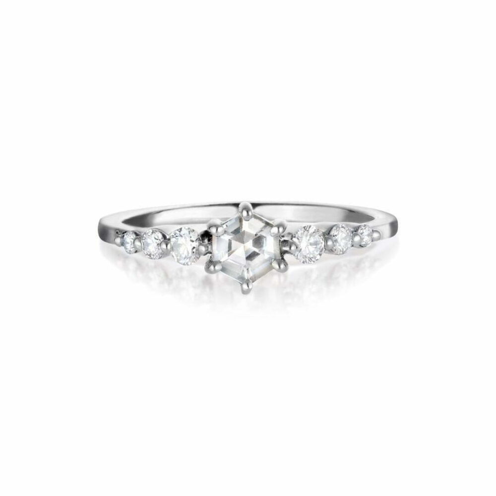 Hexagon white sapphire ring set in 18K white gold with diamonds