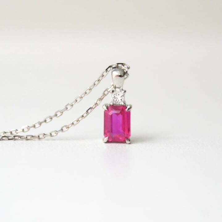 Hot pink ruby and diamond necklace set in 18K white gold