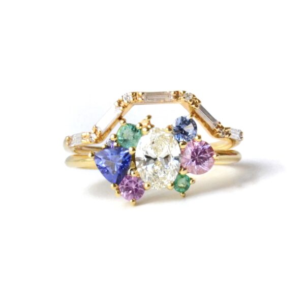 Diamond stack with a combination of sapphires, emeralds and tanzanites set in 18K yellow gold