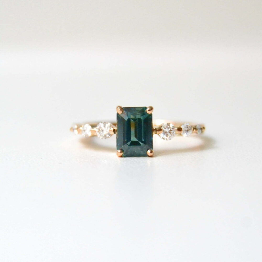 Green sapphire solitaire ring with diamonds set in 18K rose gold