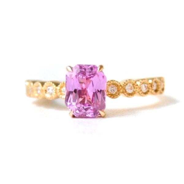 pink sapphire ring with diamonds set in 18k yellow gold