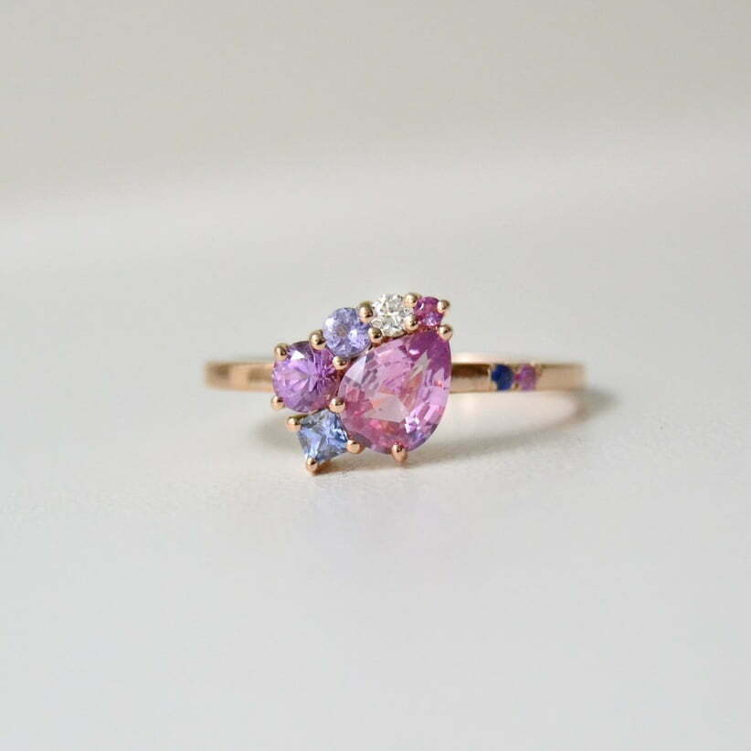 Pink sapphire set with diamond and tanzanite in 18k rose gold