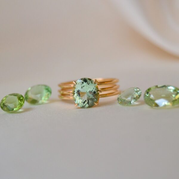 Oval green tourmaline ring in yellow gold
