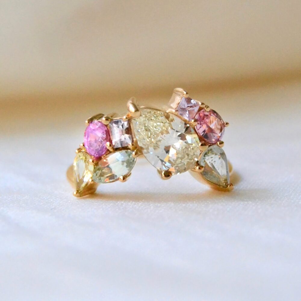 Diamond cluster ring with pastel sapphires
