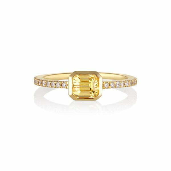 Unheated yellow sapphire ring set with VS1 diamonds in 18K yellow gold