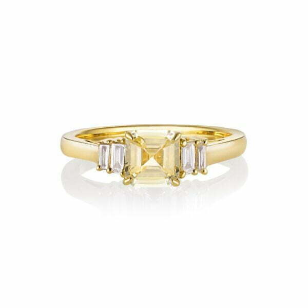 Yellow sapphire ring with baguette diamonds set in 18k yellow gold