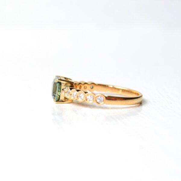 Radiant cut green sapphire ring