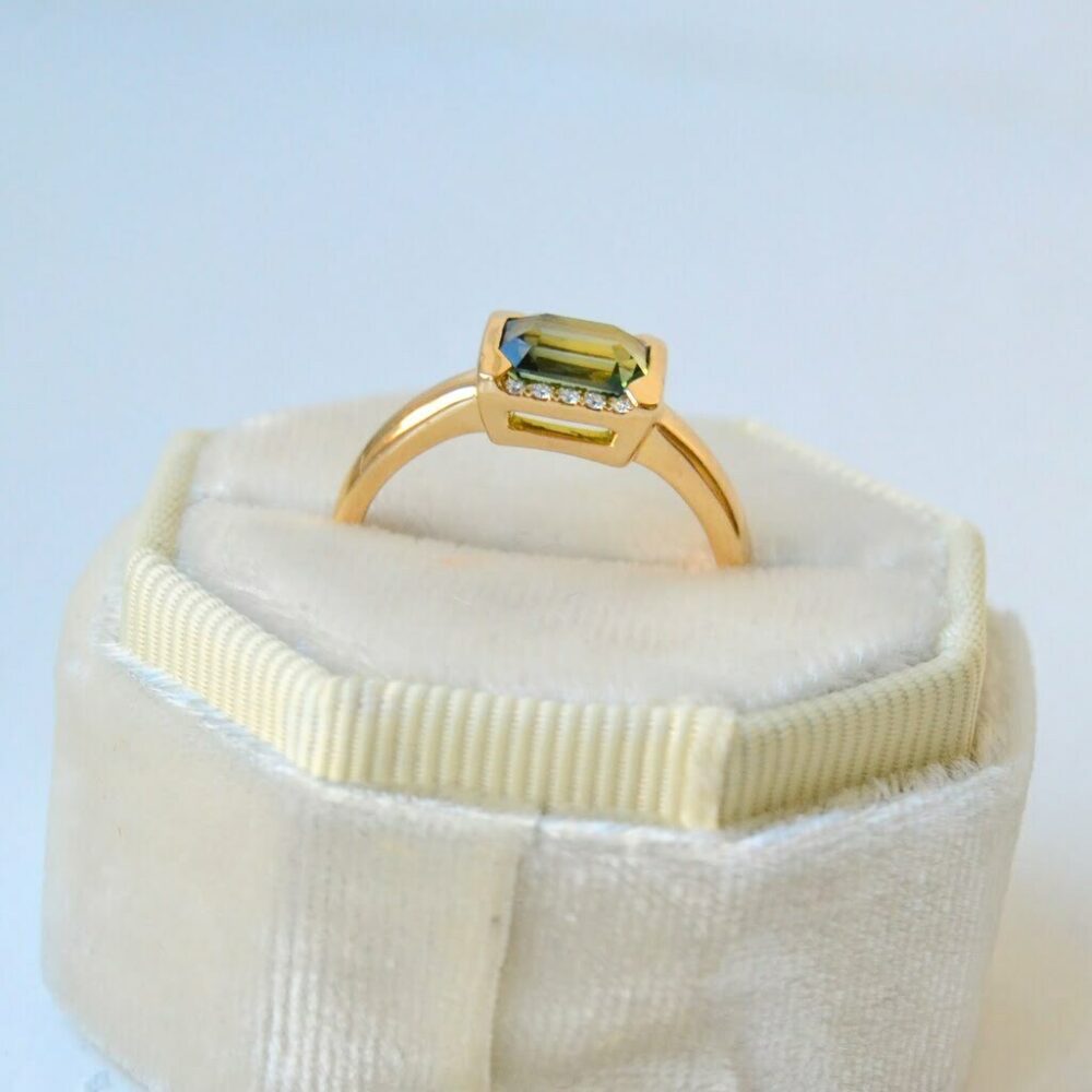 East west ring with green sapphire and diamonds