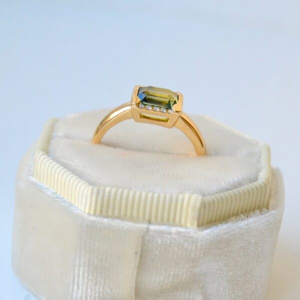 East west set green sapphire ring with diamonds