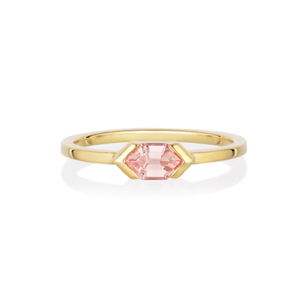 Peach sapphire ring set in 18K yellow gold