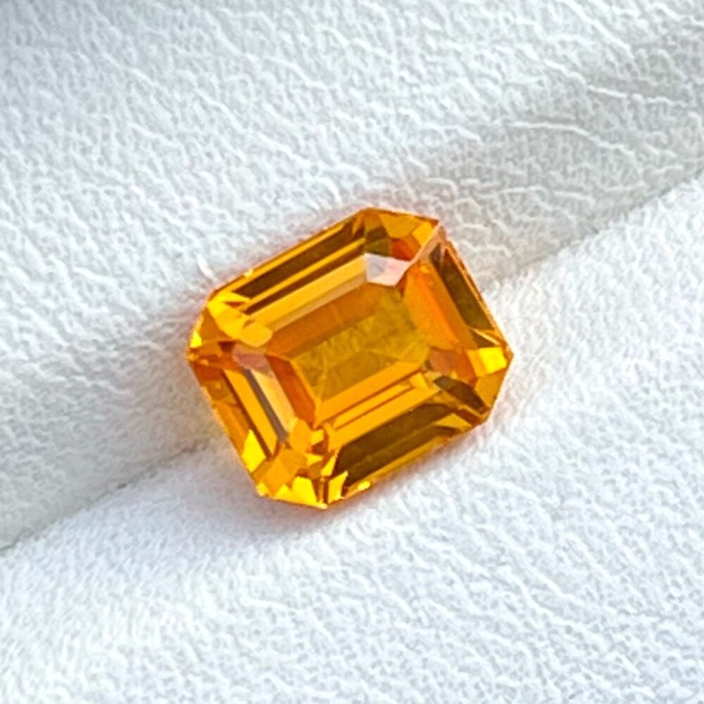 Emerald cut orange sapphire