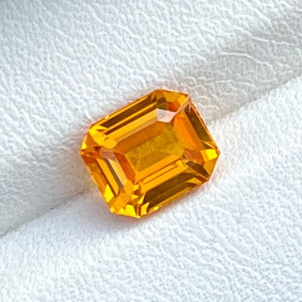 Emerald cut orange sapphire