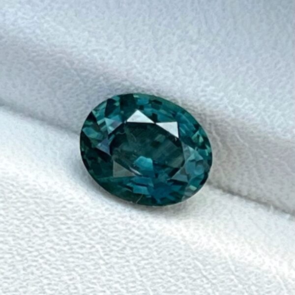 Oval teal sapphire