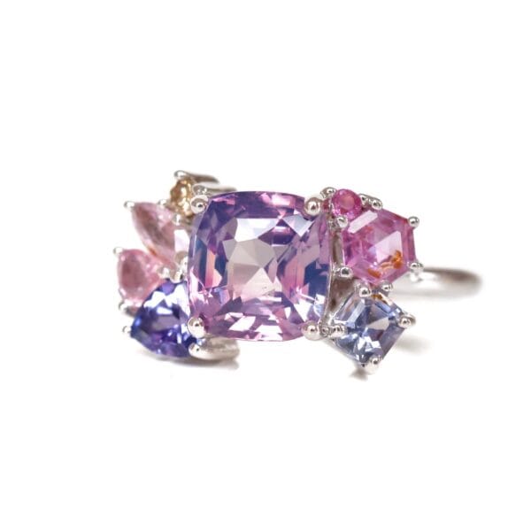 Bi-color sapphire cluster ring with spinels, champagne diamond and sapphires