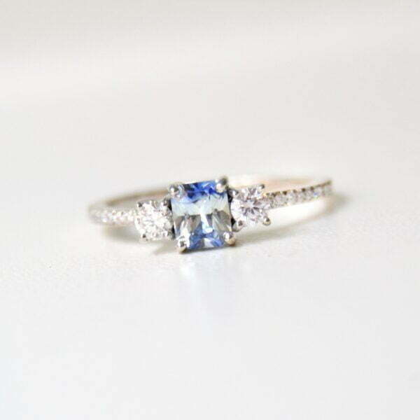 Three stone ring with bi-color sapphire and diamonds