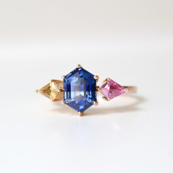 Hexagon sapphire three stone ring with bi-color, pink and yellow sapphires