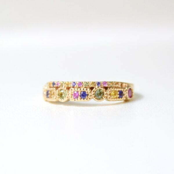 Ring band with pastel sapphires set in 14 k yellow gold