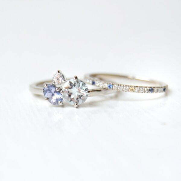 aquamarine ring stack with sapphires and diamonds set in 18K white gold.