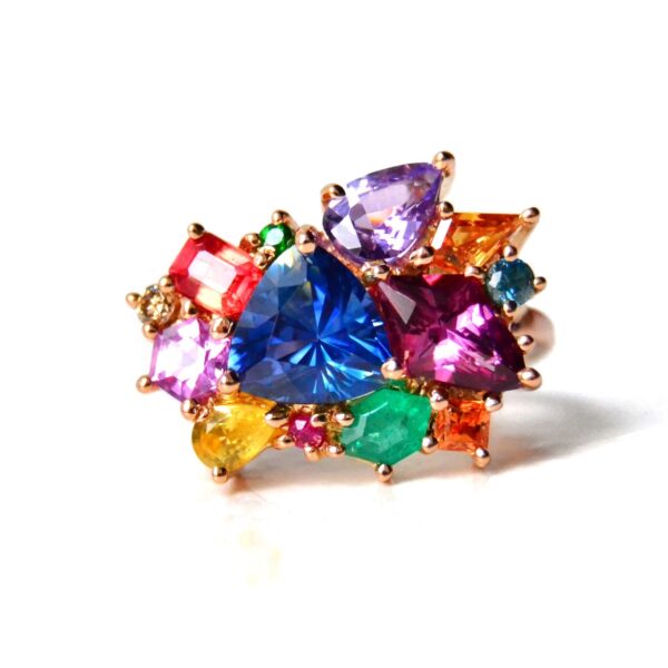 Trillion sapphire cluster ring with emeralds, garnet, sapphire and diamonds set in 18K rose gold