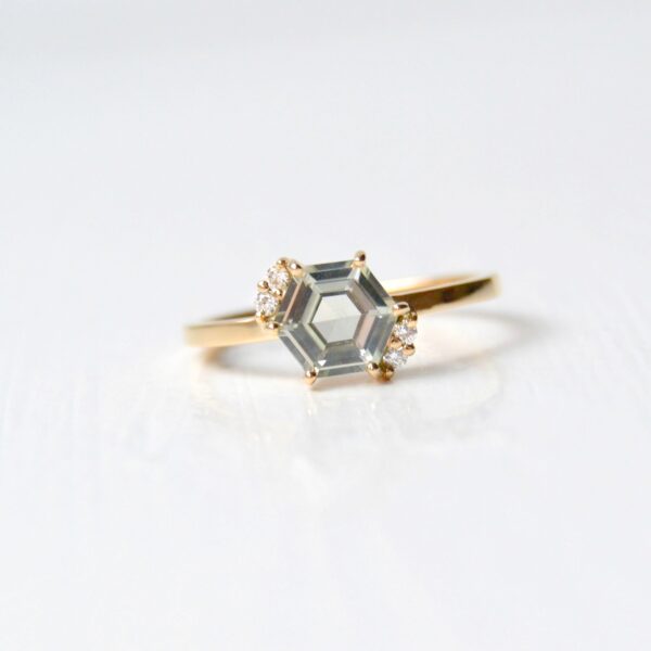 Hexagon ring with sapphire and diamonds set in 18K yellow gold