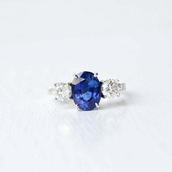 blue sapphire ring with heirloom diamonds set in 18K white gold.