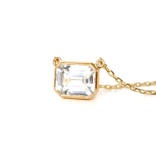 Bezel set necklace with 2ct white sapphire