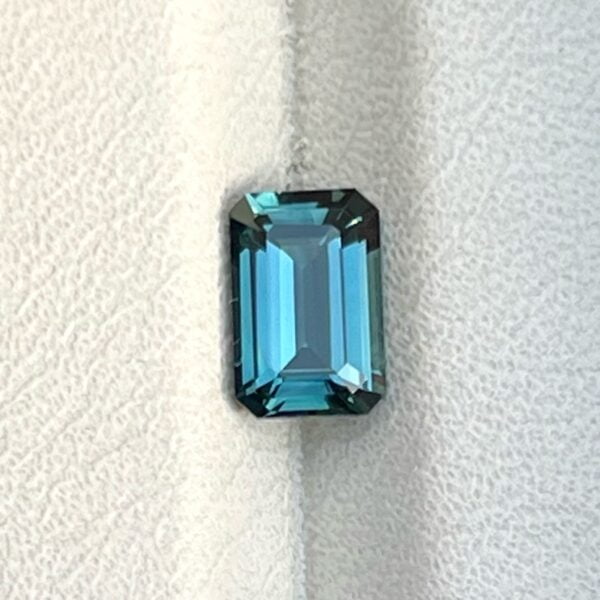 Emerald cut teal sapphire on 1.28ct