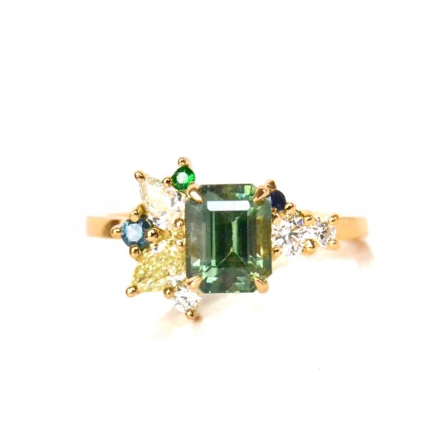 Green sapphire cluster ring with diamonds