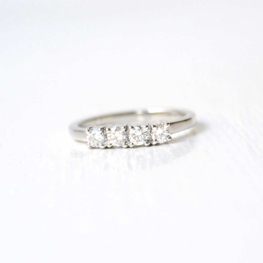 Four stone diamond ring