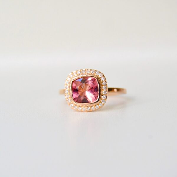 Pink tourmaline ring with VS1 diamonds set in 18K rose gold