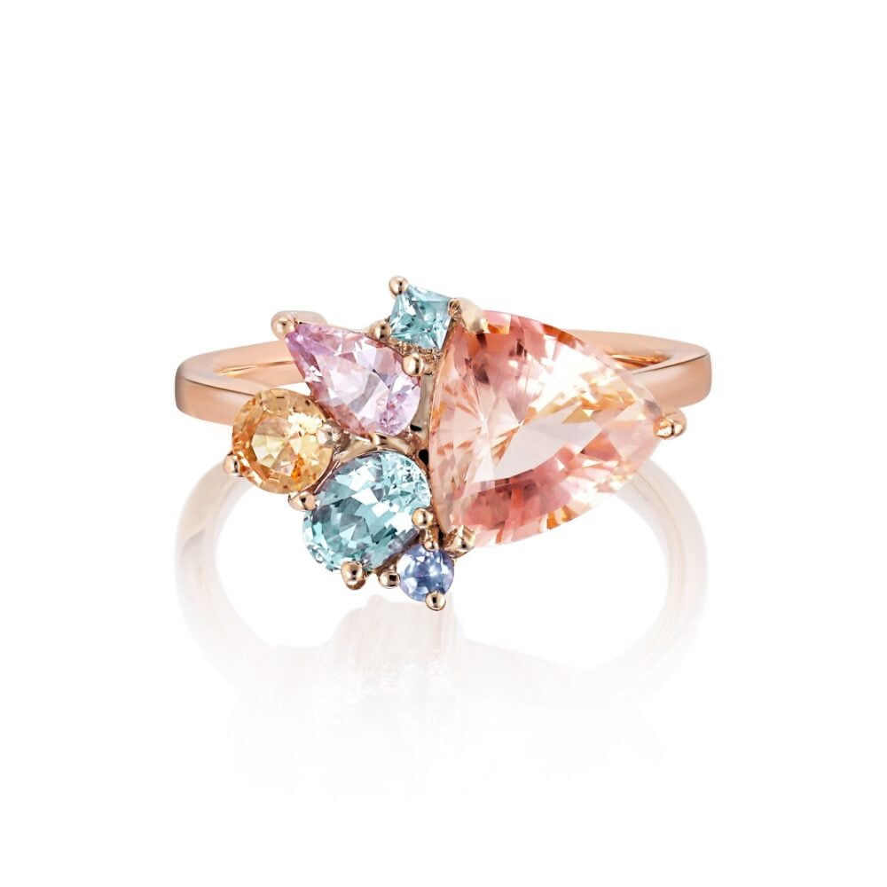 Peach cluster ring with peach tourmaline and pastel sapphires set in 18K rose gold
