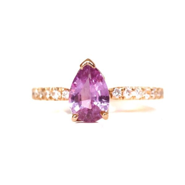 Purple sapphire solitaire ring with diamonds