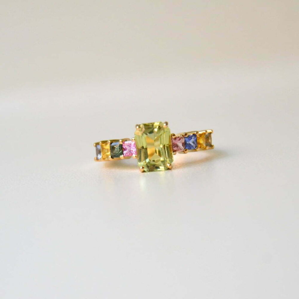 Green tourmaline ring with multicolor sapphires set in 18K yellow gold